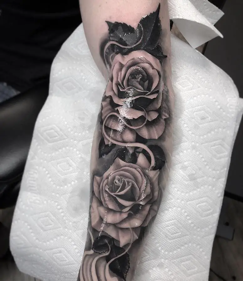 rose tattoo on arm 
