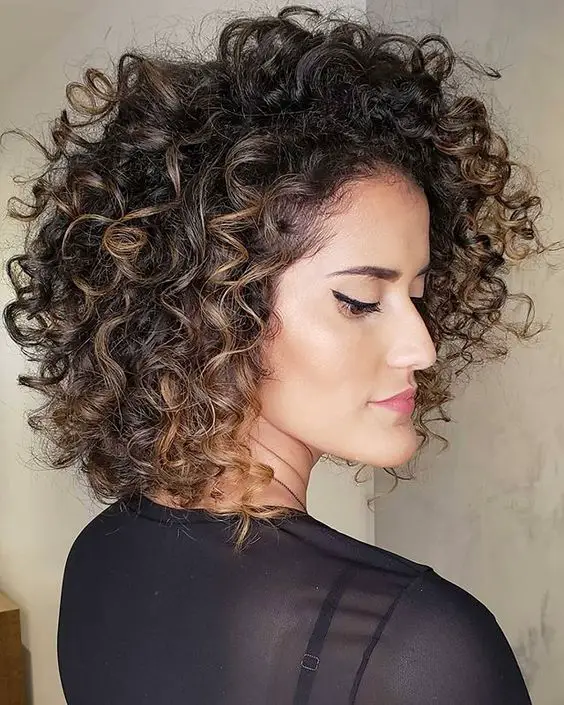 Long curly bob hair seen from the side